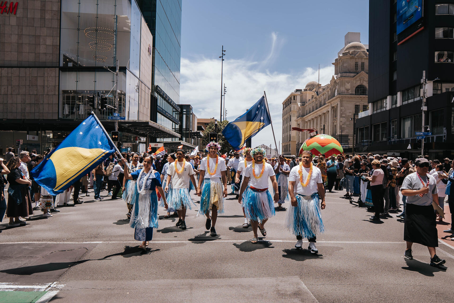 MTTA marching in Auckland parade with Tokelau flags