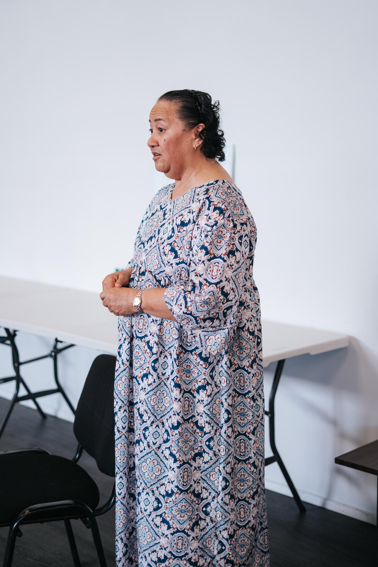 Community elder speaking at event