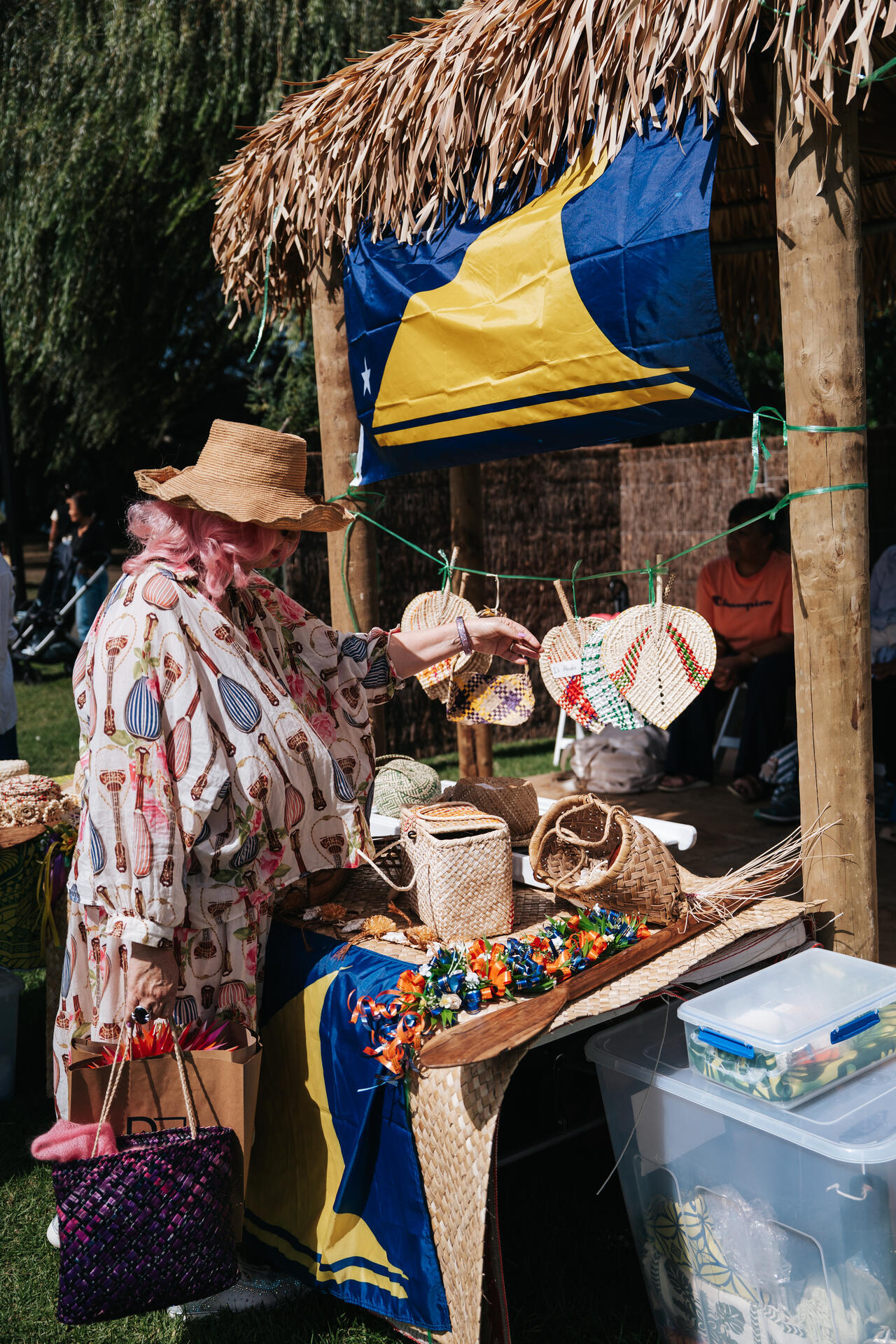 Traditional crafts and woven goods at market fale stall