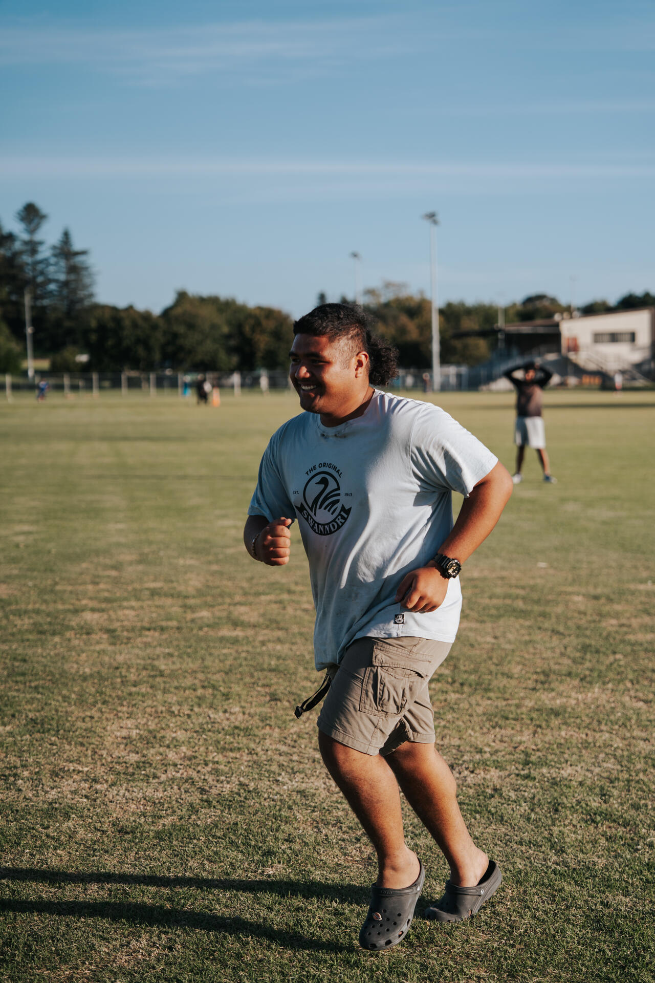 Youth running on sports field