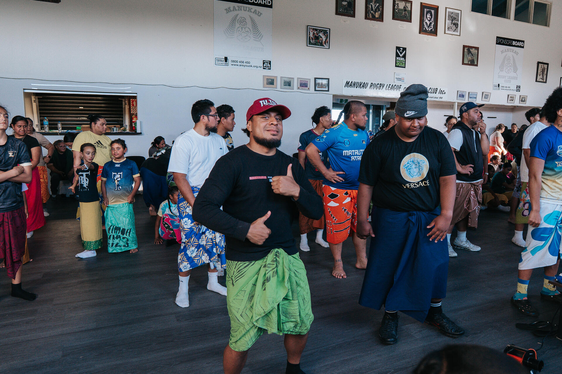 Youth giving thumbs up during fatele practice