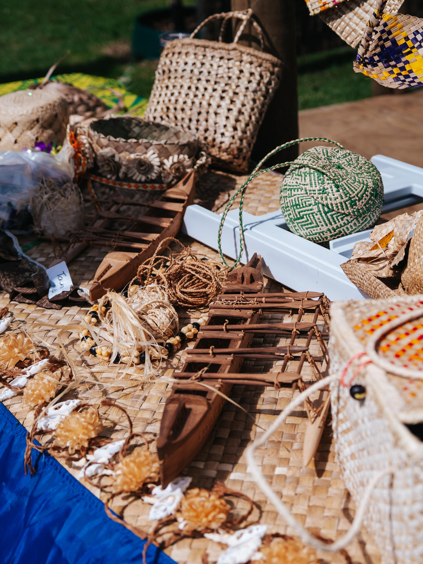 Traditional Tokelauan crafts and woven baskets on display at market stall
