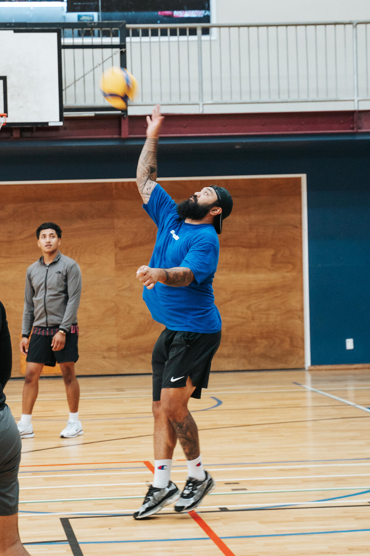 Volleyball serve at community sports day